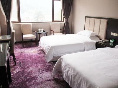 荥经鸽子花大酒店